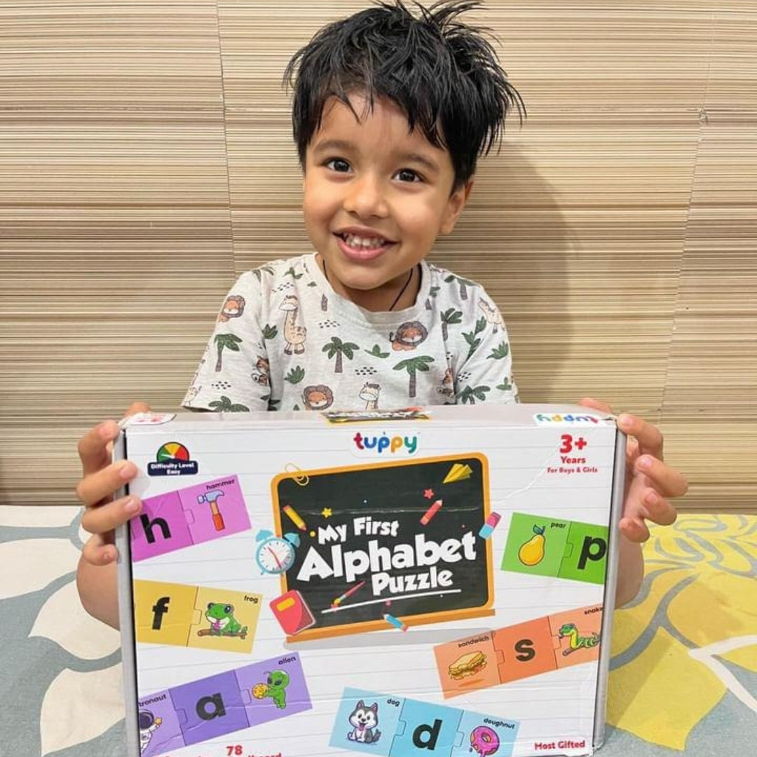 A child playing alphabet puzzle on floor